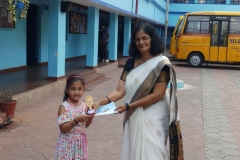 Literary meet-2021-22-Little one receiving her prize