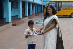 Literary meet-2021-22-Little one receiving his prize