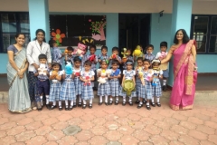 Dolls Day - Joyous moment with principal mam and teachers